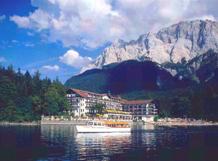 page 189. Photograph of Hotel Eibsee with the Zugspitze above.
