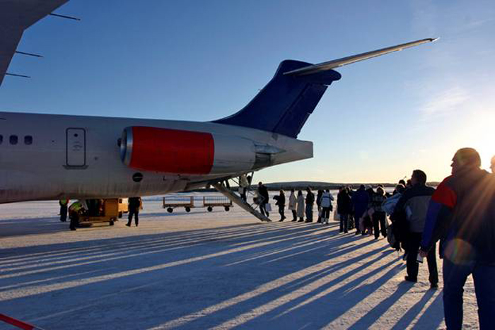 page 308. Photograph of passengers loading the Boeing 727 in Berlin.